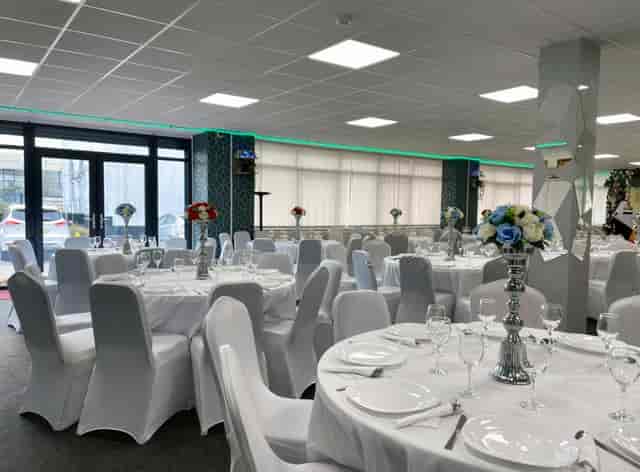 ACAA Hall: elegant event space with floral centerpieces for corporate gatherings and celebrations