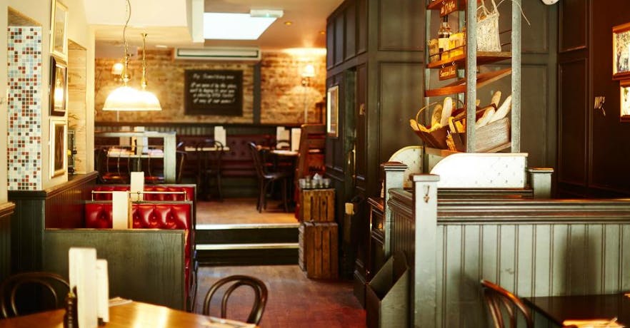 Cozy venue in Café Rouge Cardiff, perfect for intimate meetings and events.