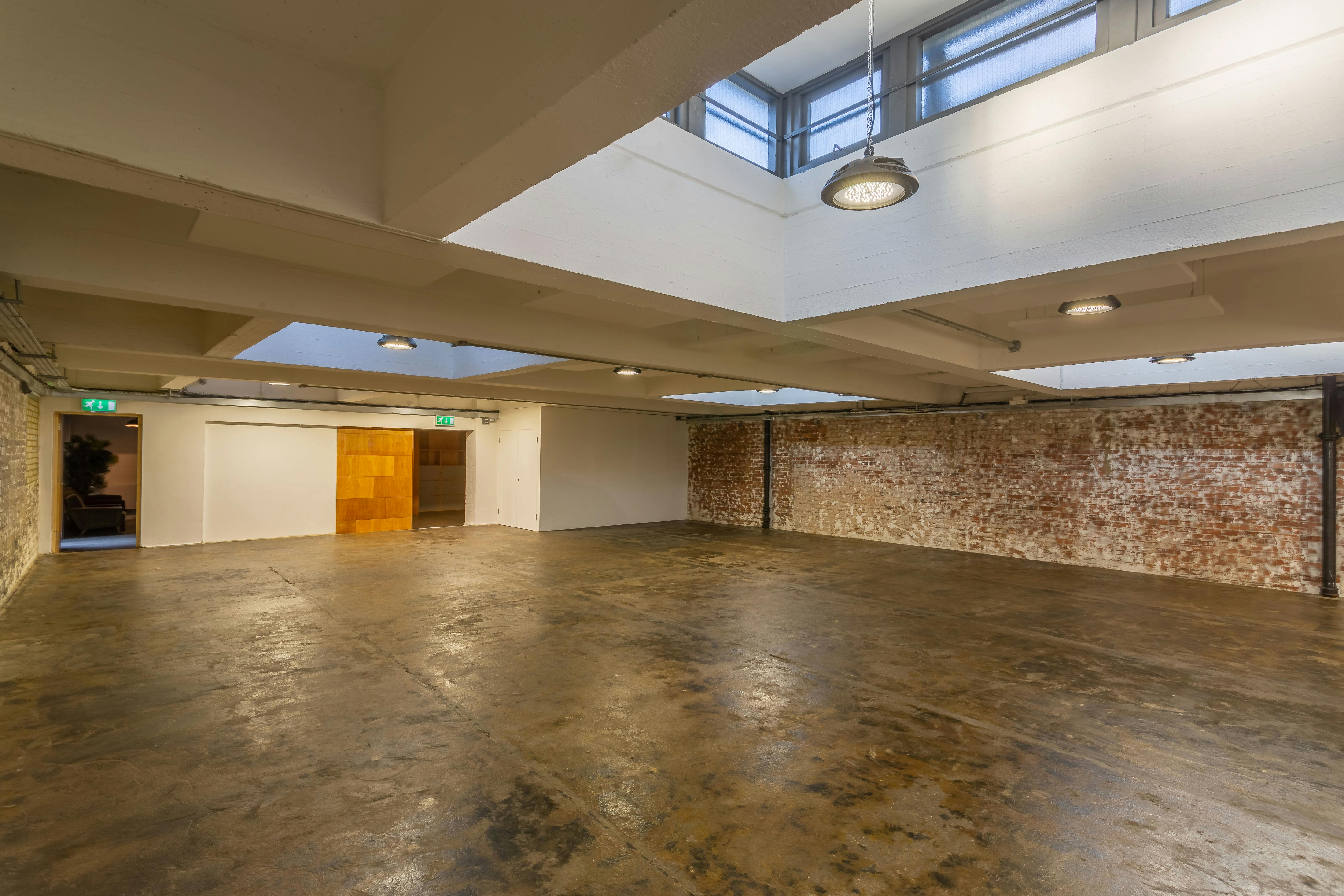 Versatile event space in Canvas London with exposed brick and natural light for workshops.