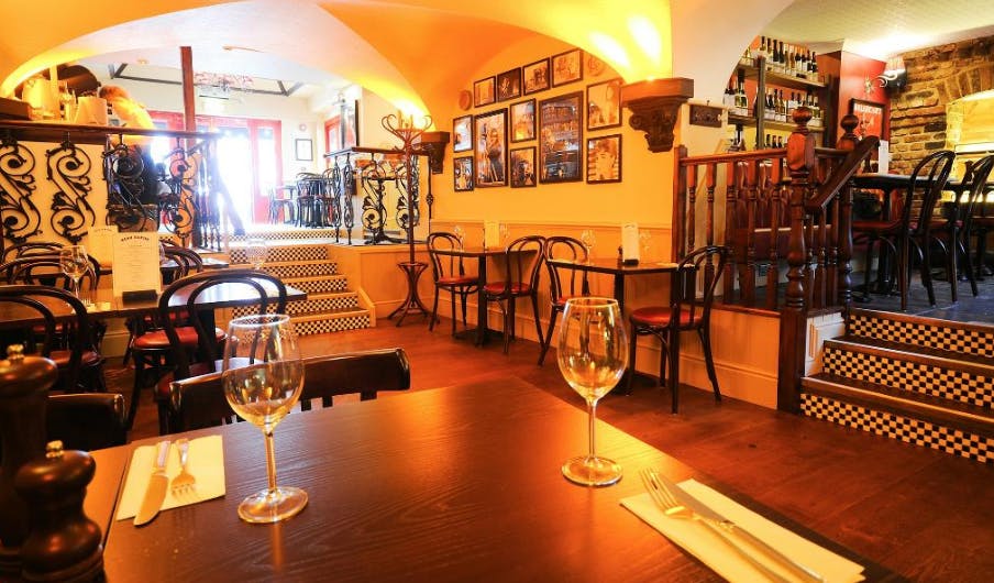 Charming Café Rouge Highgate venue with warm lighting for intimate gatherings and receptions.