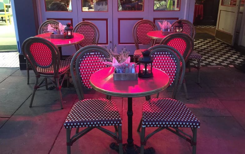 Charming outdoor seating at Café Rouge Hitchin for networking and gatherings.