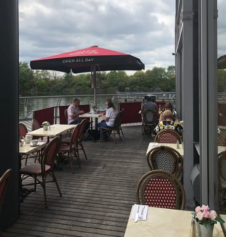 Outdoor dining area at Café Rouge Lakeside, ideal for casual meetings and networking events.