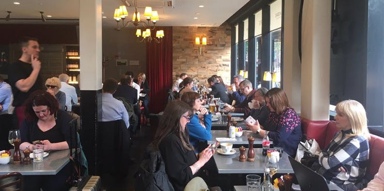 Café Rouge London Euston venue, warm lighting, ideal for networking events and meetings.