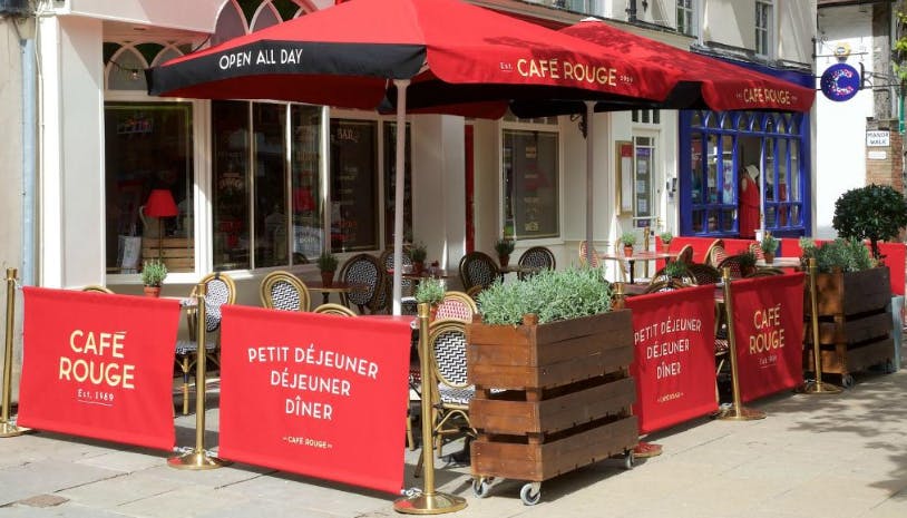 Outdoor café venue at Café Rouge Solihull with vibrant red awning for networking events.