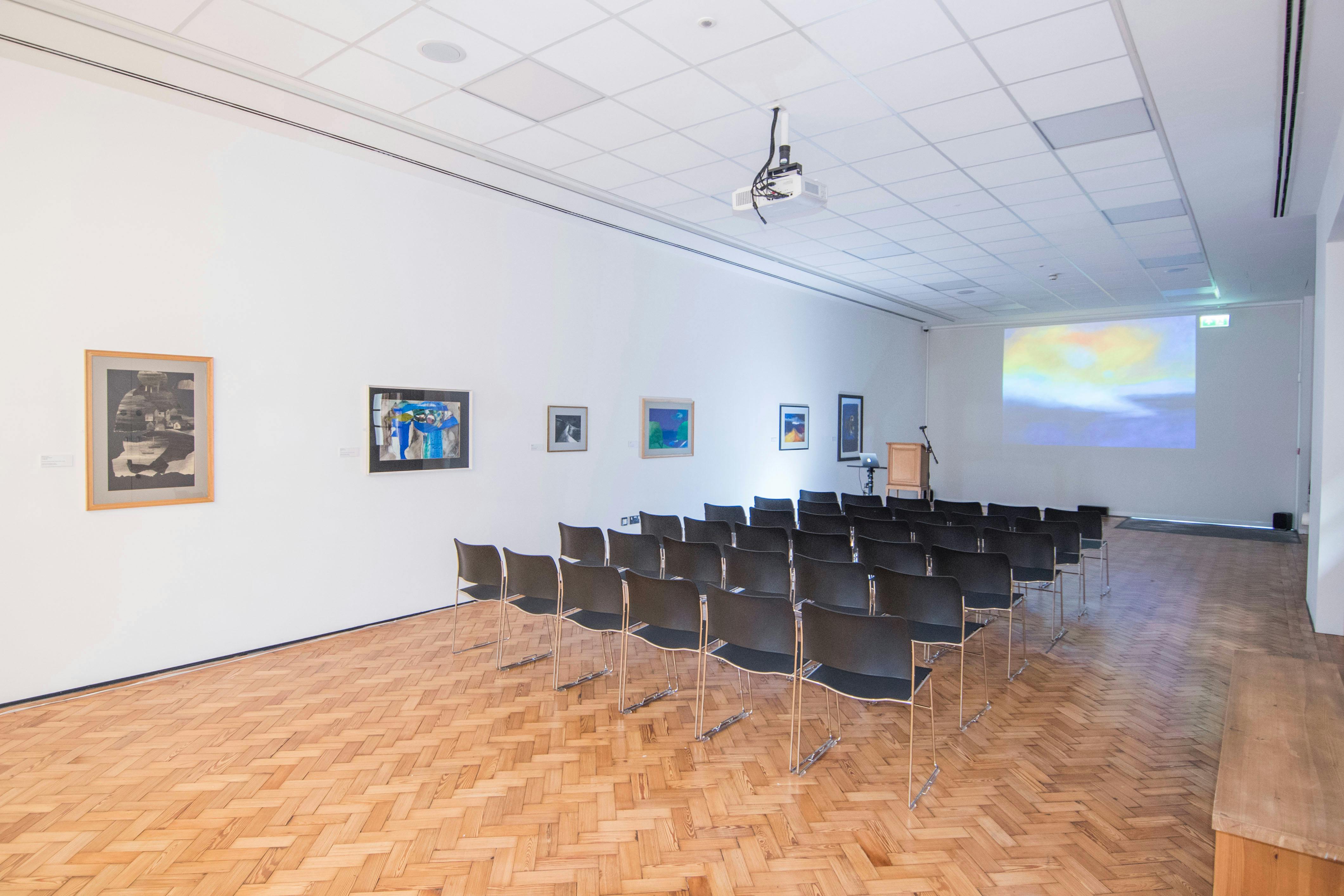 Lecture Theatre in Glynn Vivian Art Gallery, featuring chairs for engaging workshops and events.