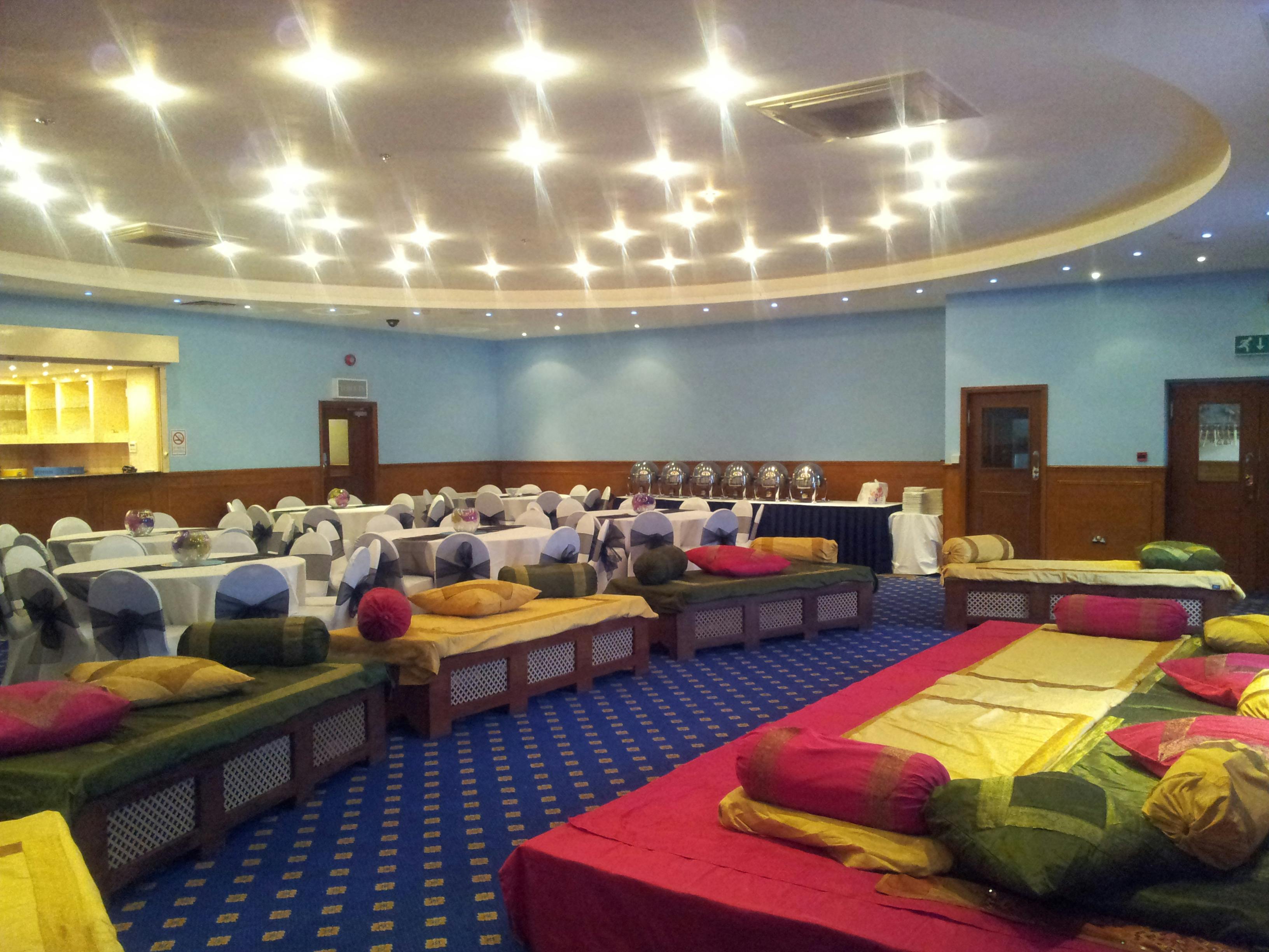 Ealing Banqueting Suite: cozy event space with colorful cushions for workshops and networking.