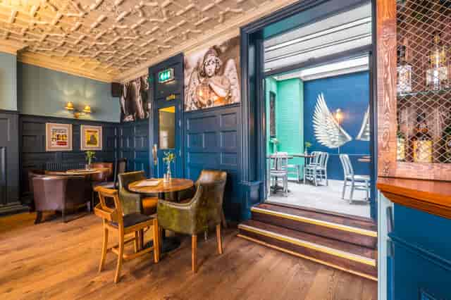 The Lounge at The Angel: mood-lit networking venue with an airy terrace for corporate events.