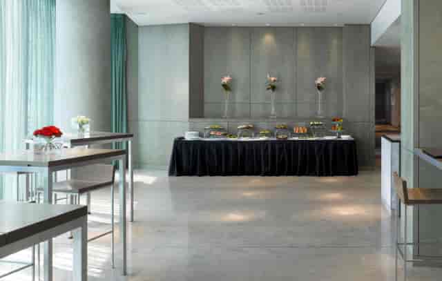 XRay Suite at Radisson Blu Birmingham, modern event space with elegant decor and buffet.