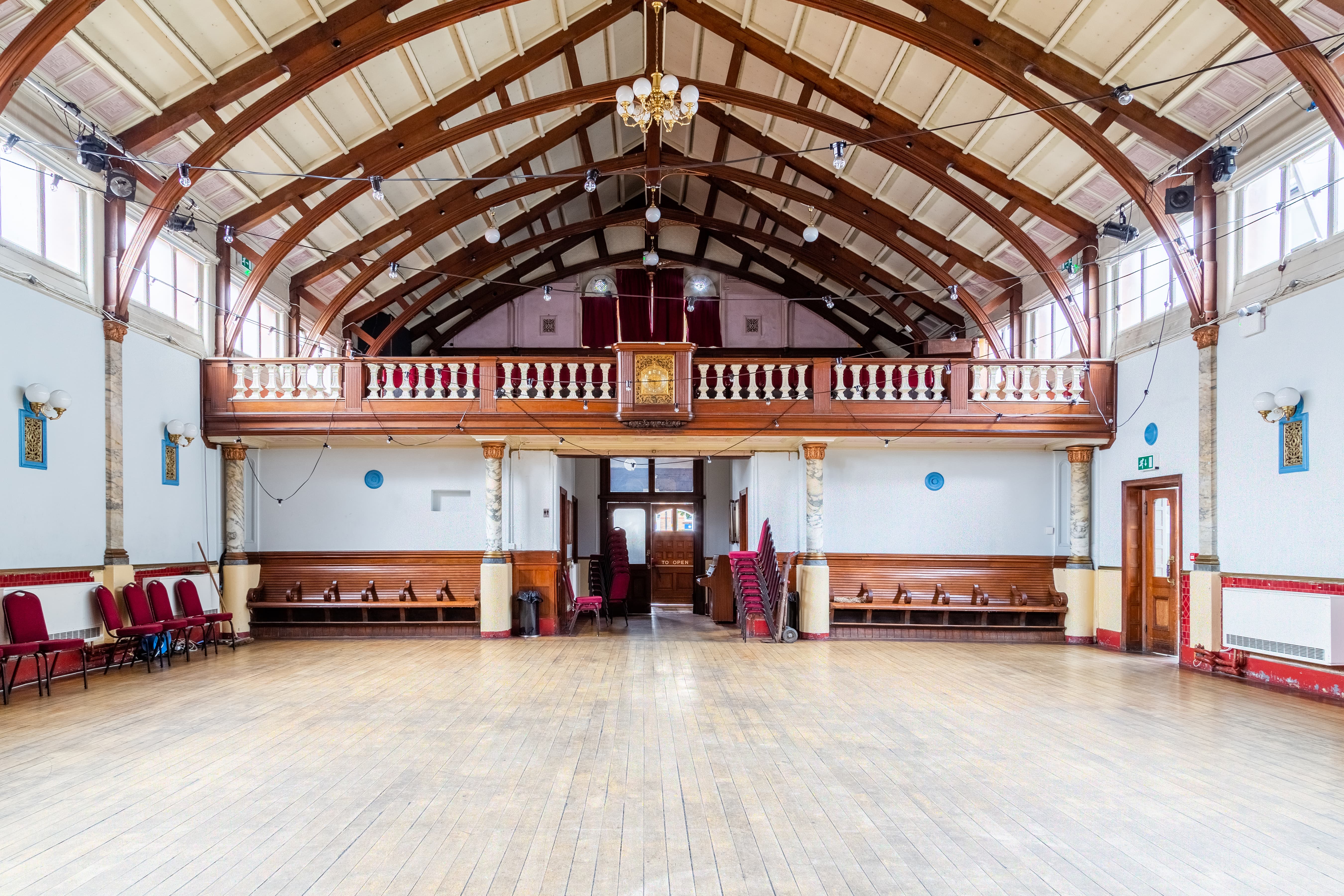 Spacious Stanley Hall venue with high ceilings for events and workshops in London. - Banner
