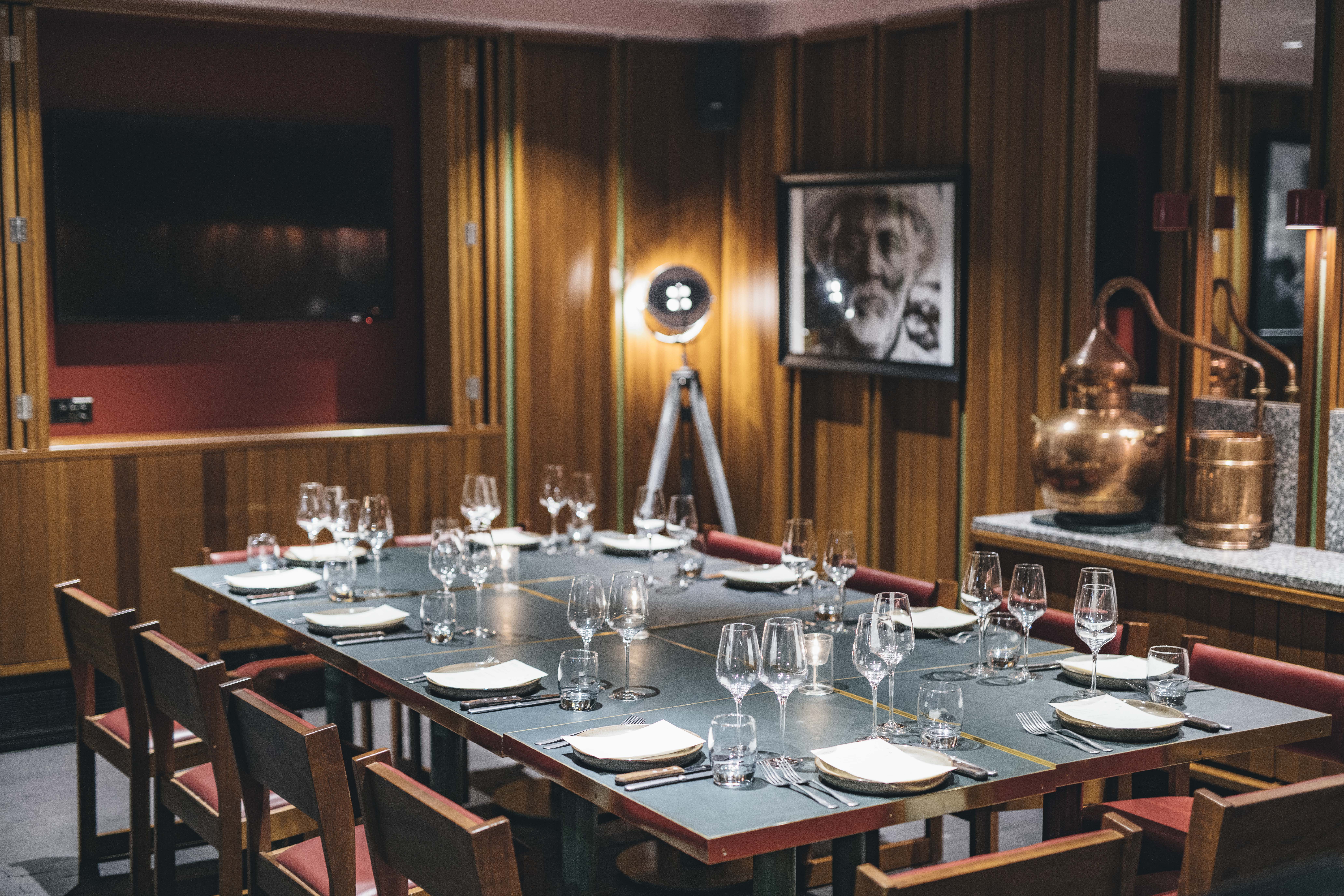 Private dining room at temper Soho with elegant table setting for exclusive events. - Banner