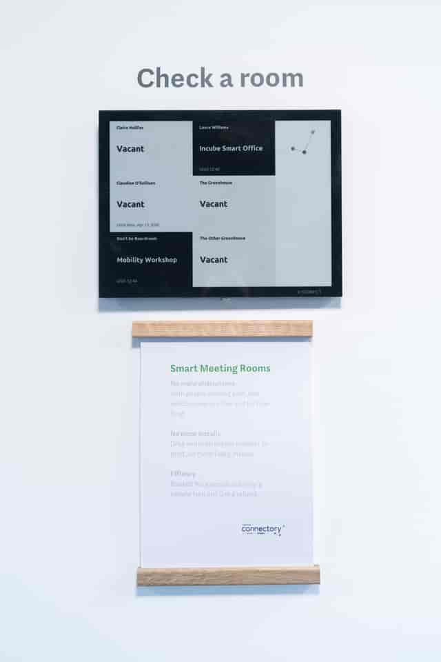 Digital meeting room display at London Connectory for efficient event management.