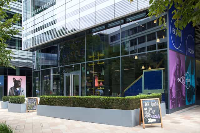 Modern reception area with large windows, ideal for networking events and gatherings.