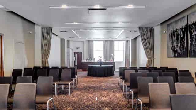 Waterloo Suite at Apex Hotel: sleek chairs, ideal for conferences and workshops.