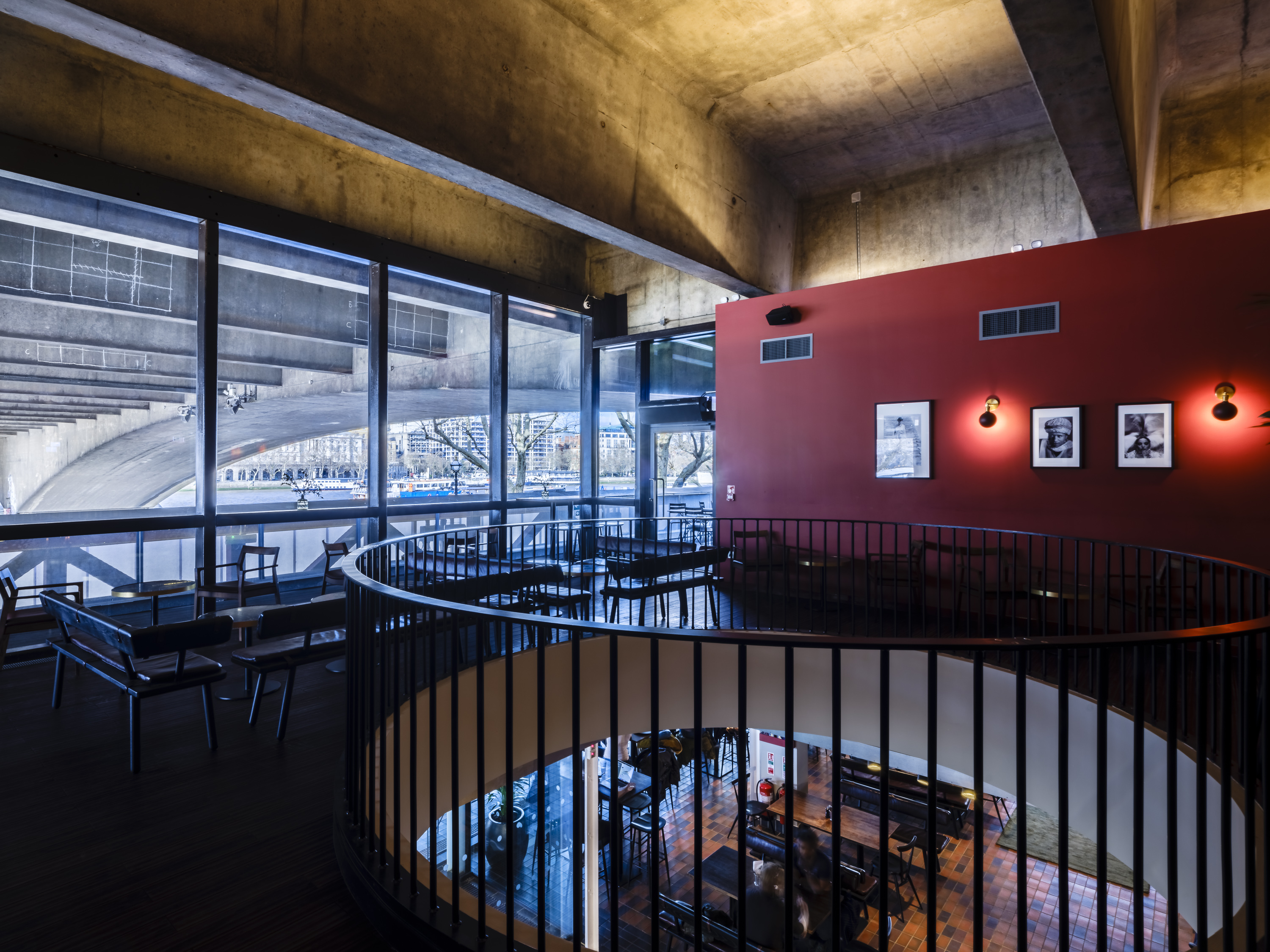 Riverfront and Balcony Bar, modern venue with large windows for networking events. - Banner
