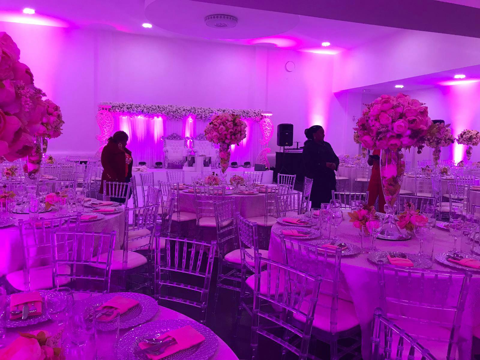 Elegant Mayfair Lounge event space with floral centerpieces for weddings and galas.