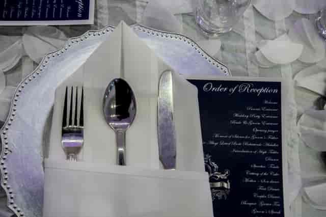Elegant dining table setup in The Mayfair Grand Ballroom for a reception event.