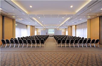 Spacious Milano Suite conference room at Radisson Blu, ideal for corporate events.