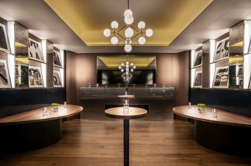 Private dining room in Sette with sleek furniture, ideal for meetings and gatherings.