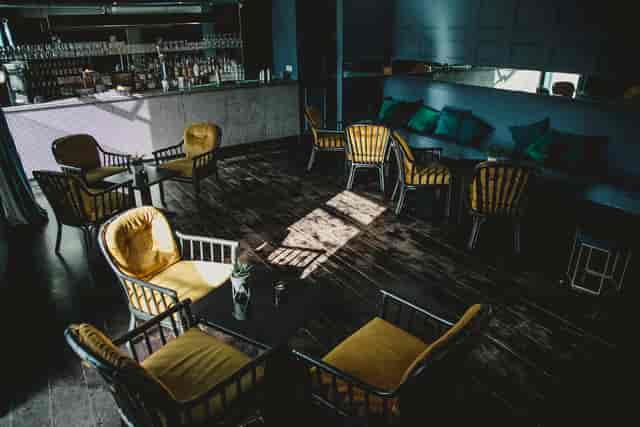 Intimate lounge at The Exhibit with banquet seating for high-end networking and breakout sessions.