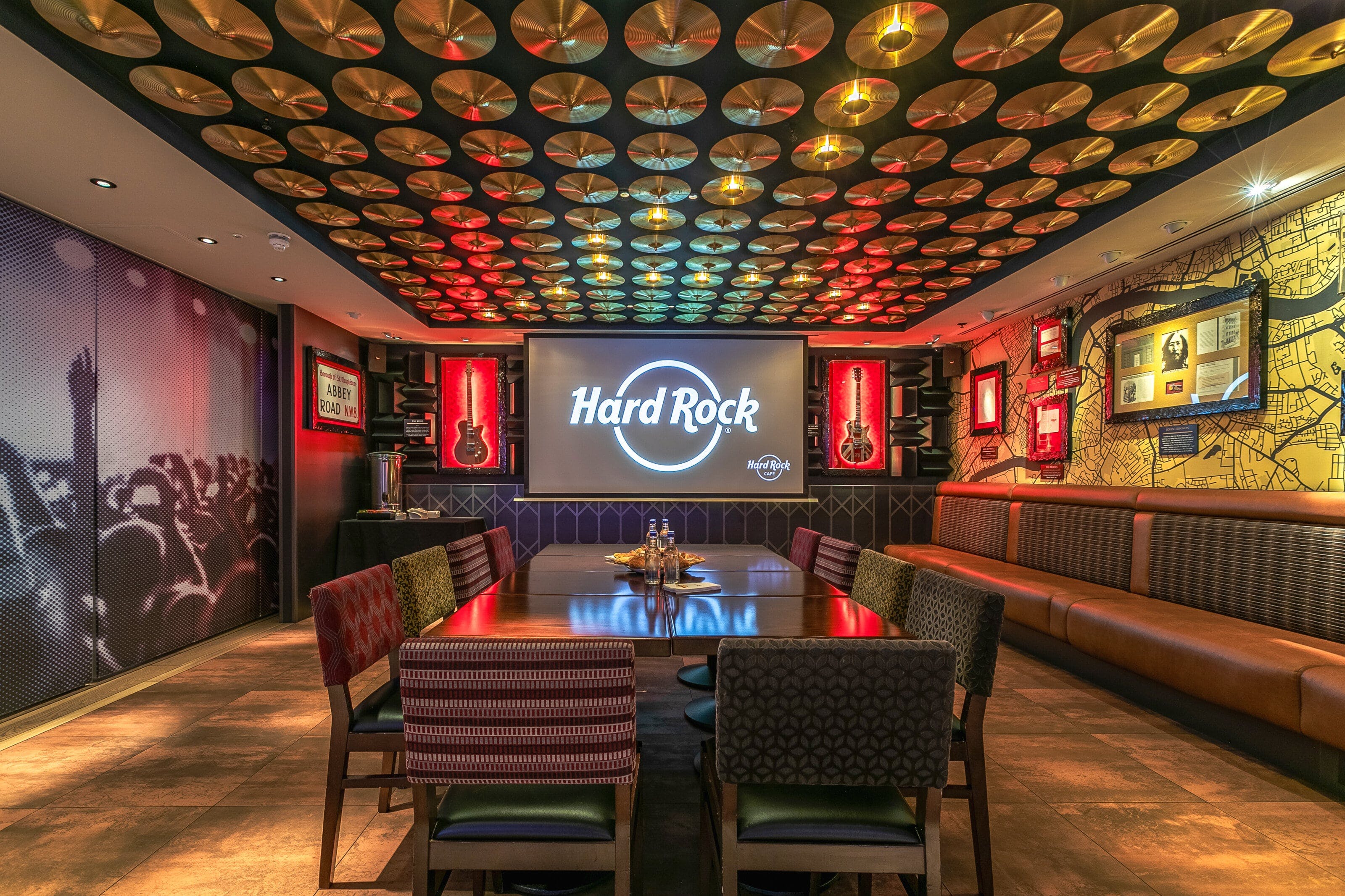 Legends Room at Hard Rock Cafe: vibrant meeting space with gold records, ideal for corporate events.