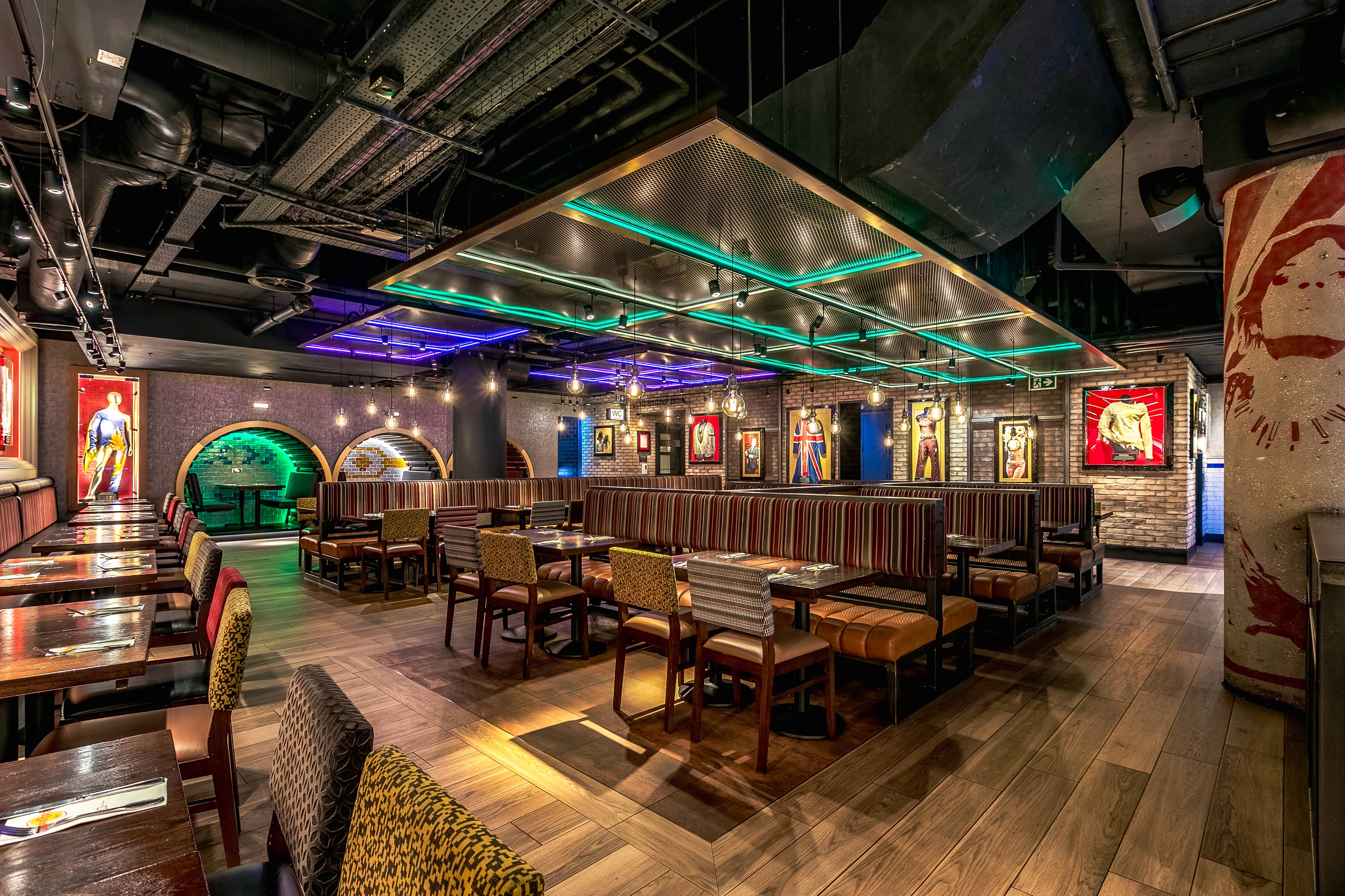 Modern event space at Hard Rock Cafe Piccadilly Circus with vibrant decor and flexible seating. - Banner