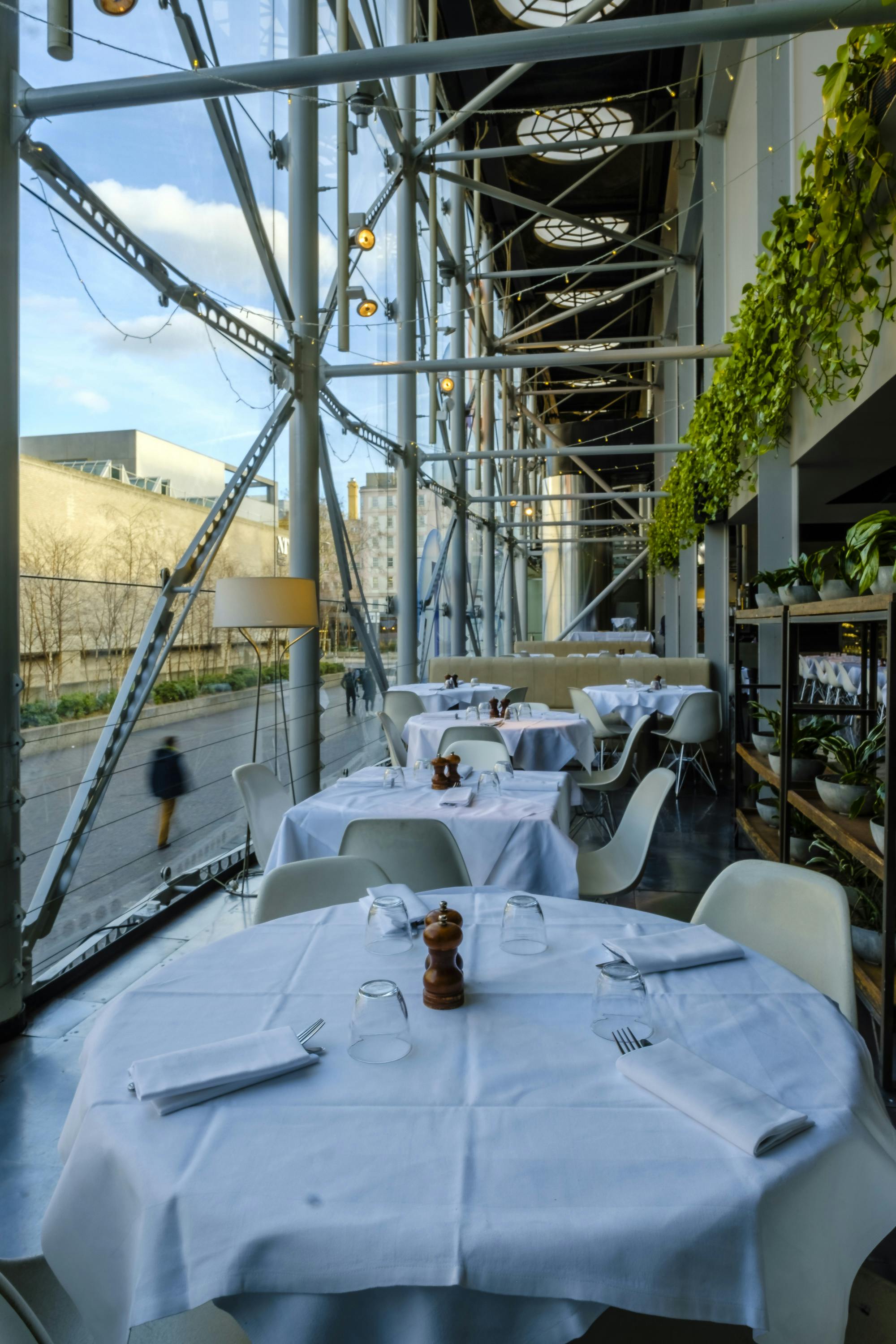 Modern dining space at BFI Bar & Kitchen, ideal for events with elegant tables and natural light.