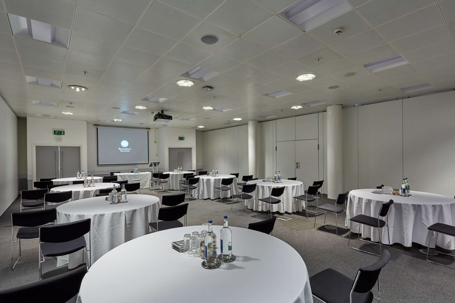 Event Suite at Thinktank: modern meeting space with round tables for corporate workshops. - Banner