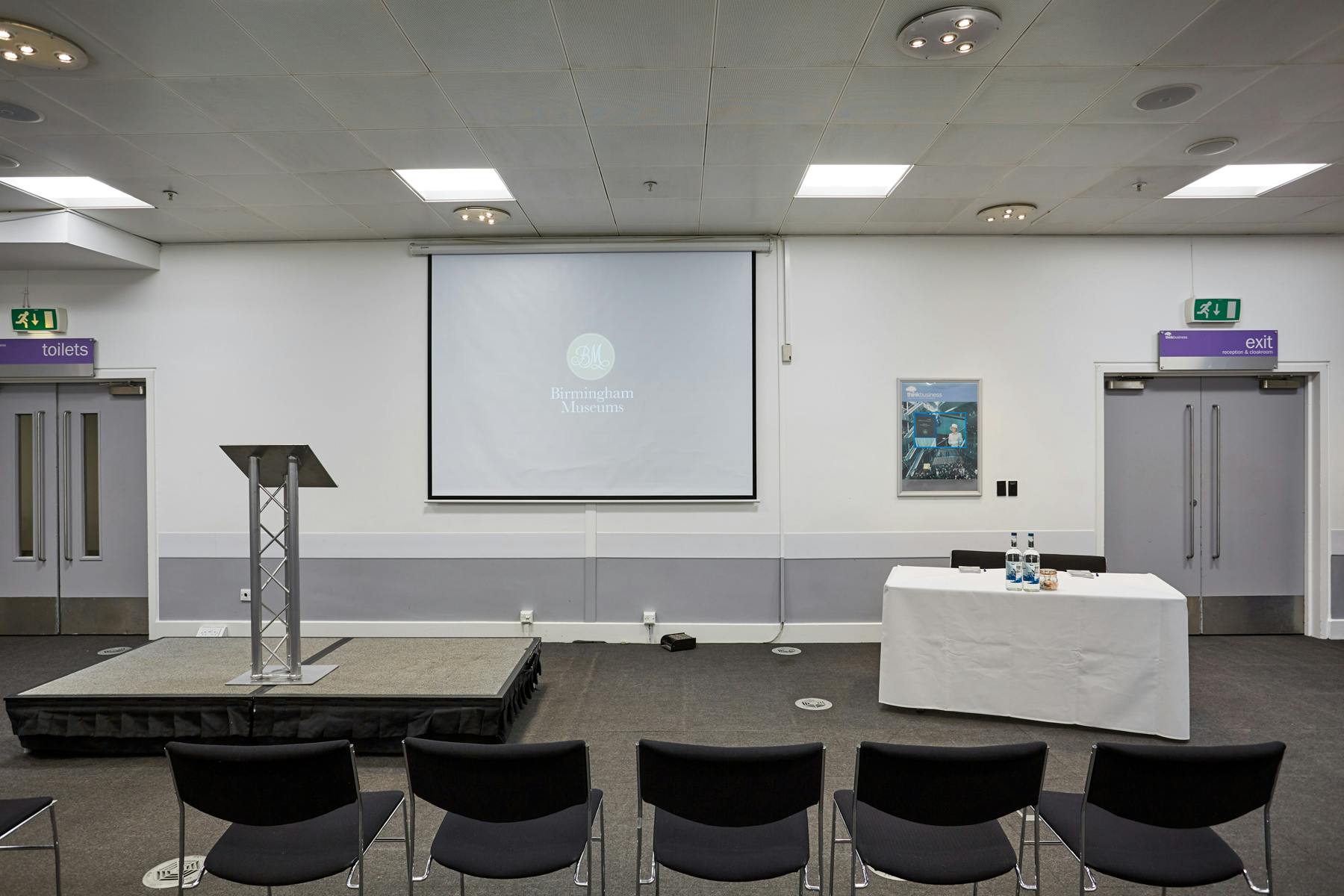 Event Suite at Thinktank: organized meeting space with podium, ideal for conferences and workshops.