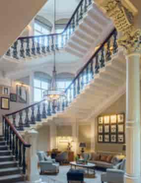 Elegant staircase in Oak Room, The Principal York, ideal for events and gatherings.