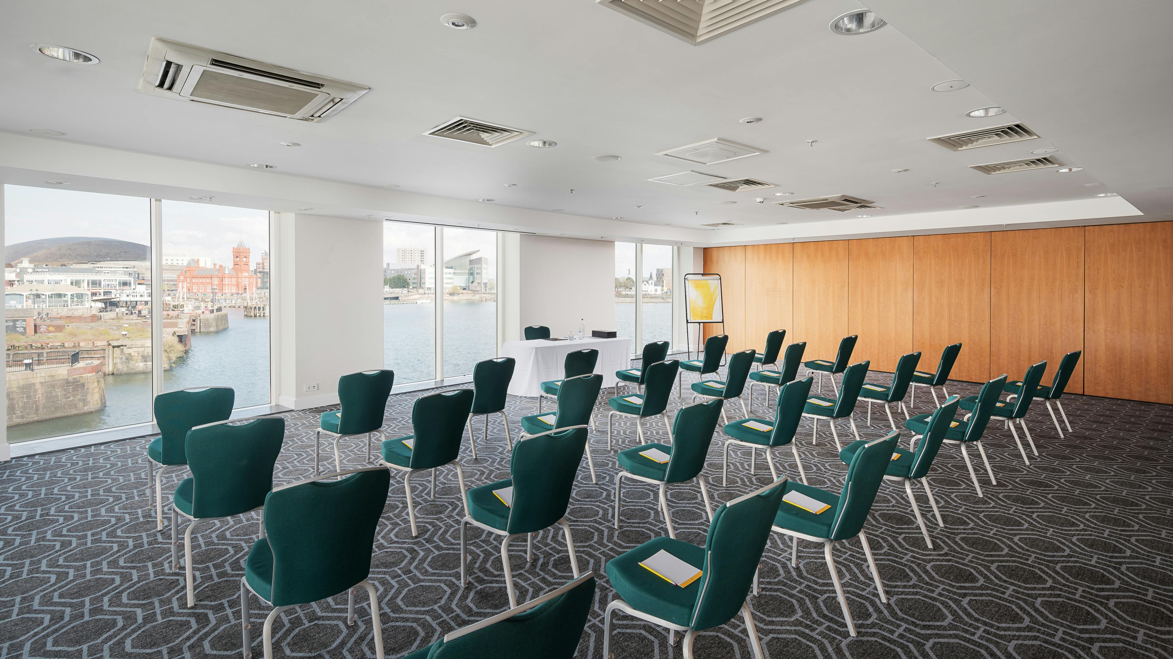 Roald Dahl Suite at Voco St David's Cardiff, teal chairs for seminars and workshops.