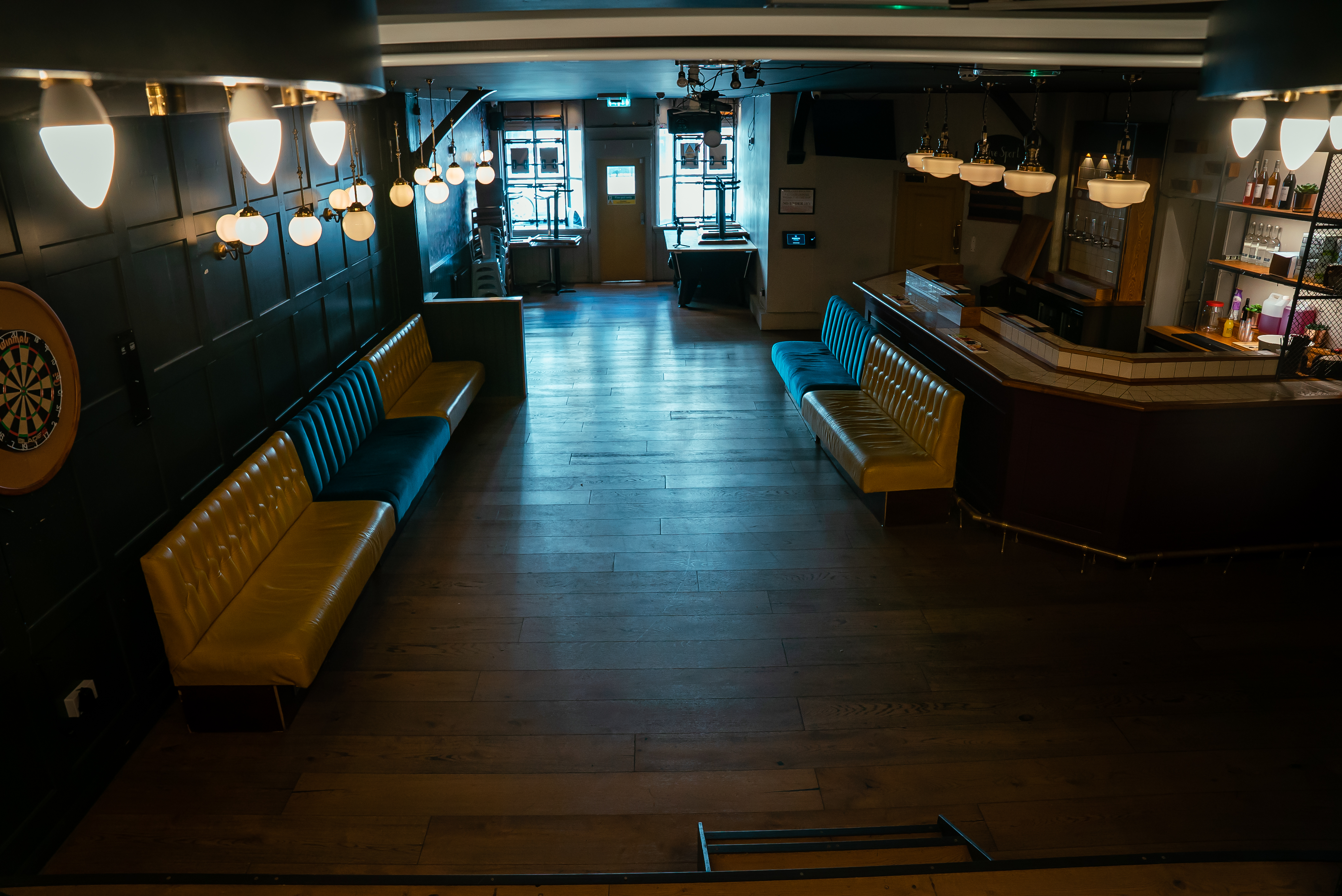 Tigers Lounge event space with stylish seating and bar for social or corporate gatherings. - Banner