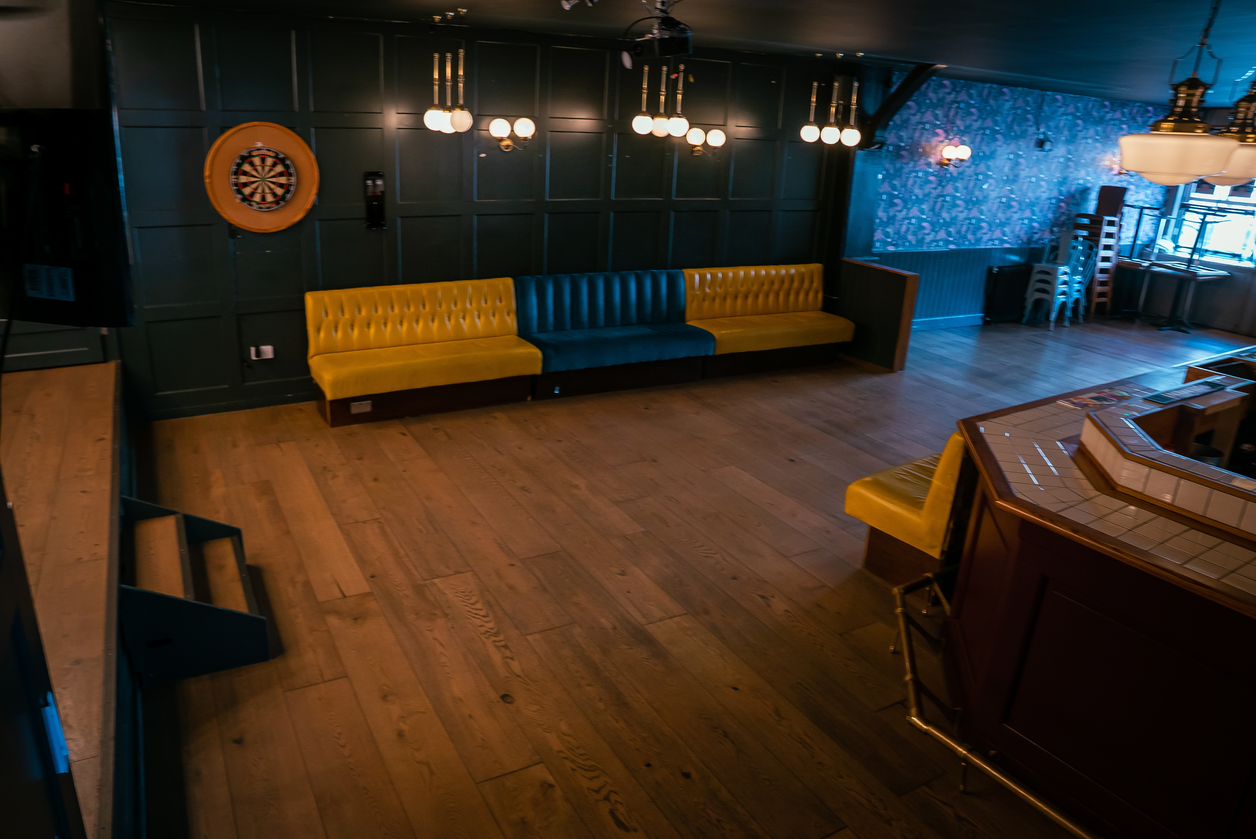 Stylish event space at Tigers Lounge with vibrant seating for networking and gatherings. - Banner