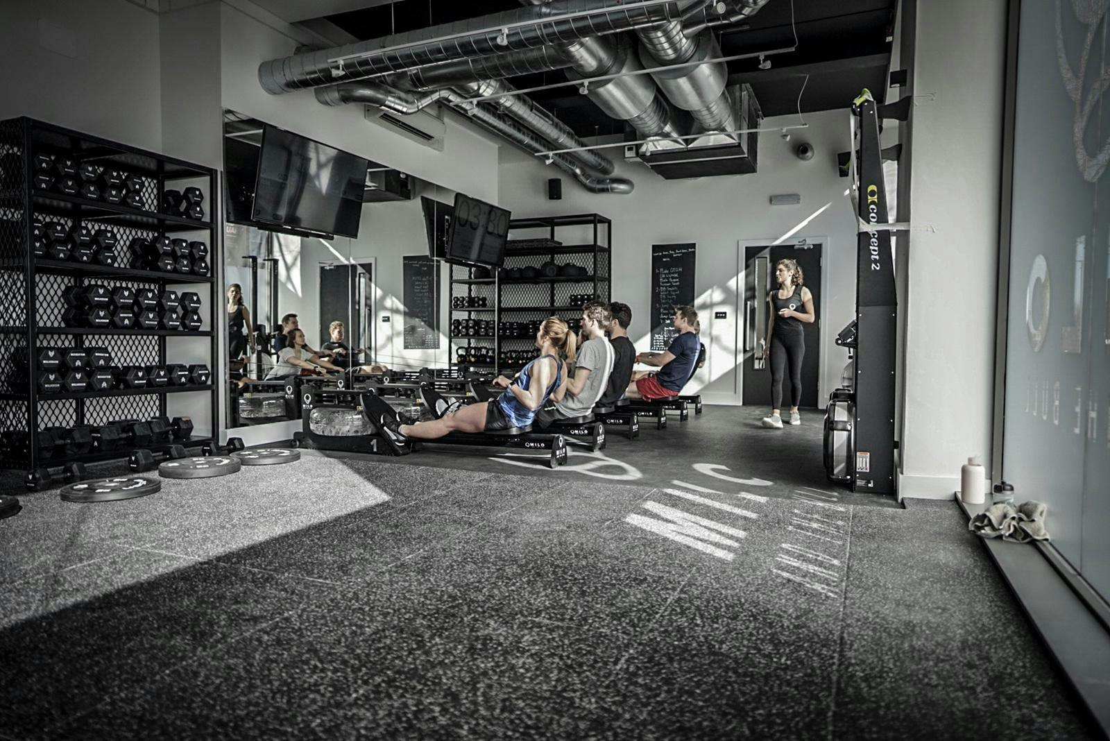 Modern fitness studio with sleek equipment for wellness events and corporate retreats.