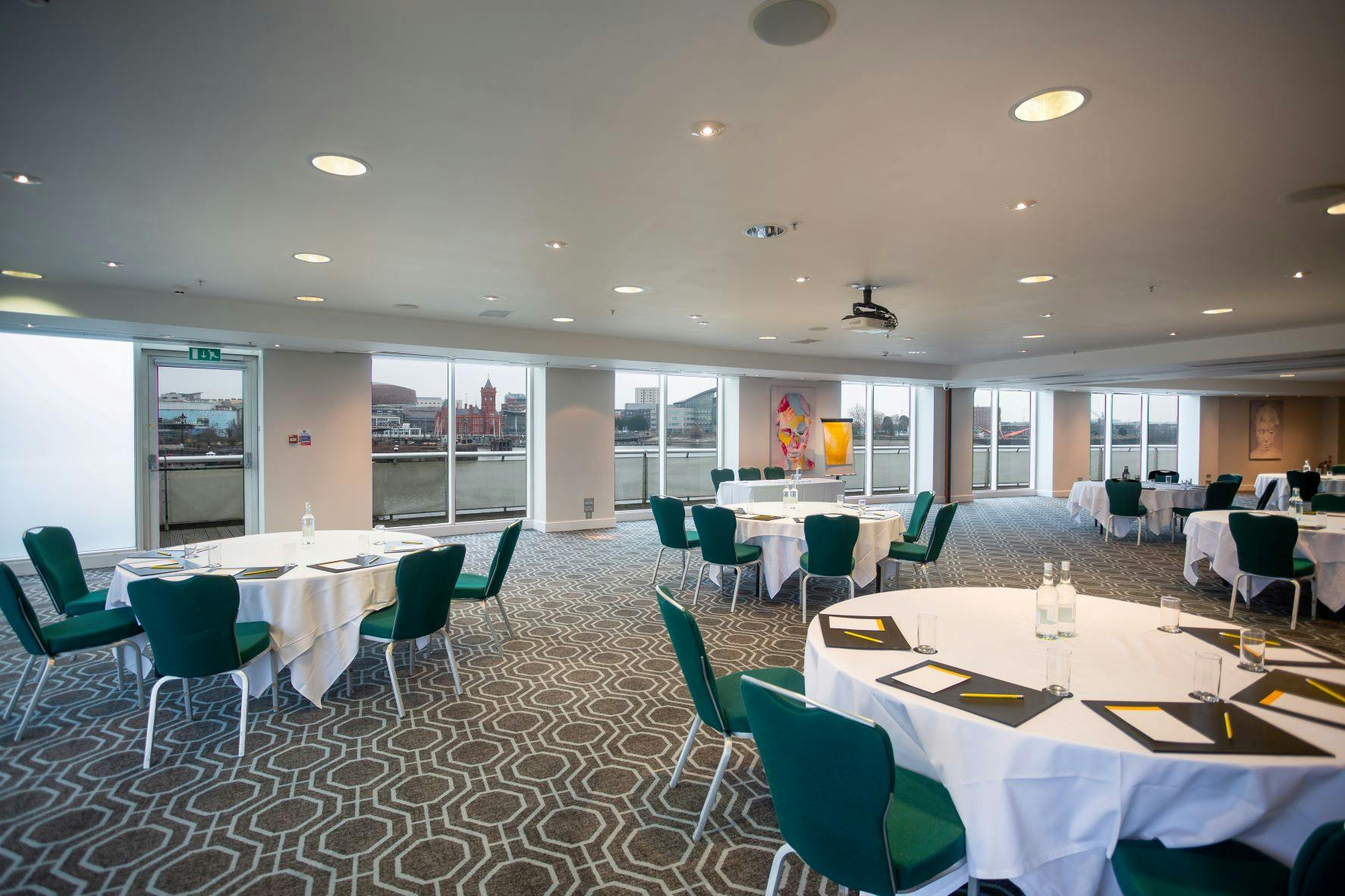 Dylan Thomas Suite at Voco St David's, Cardiff: elegant meeting space with natural light.