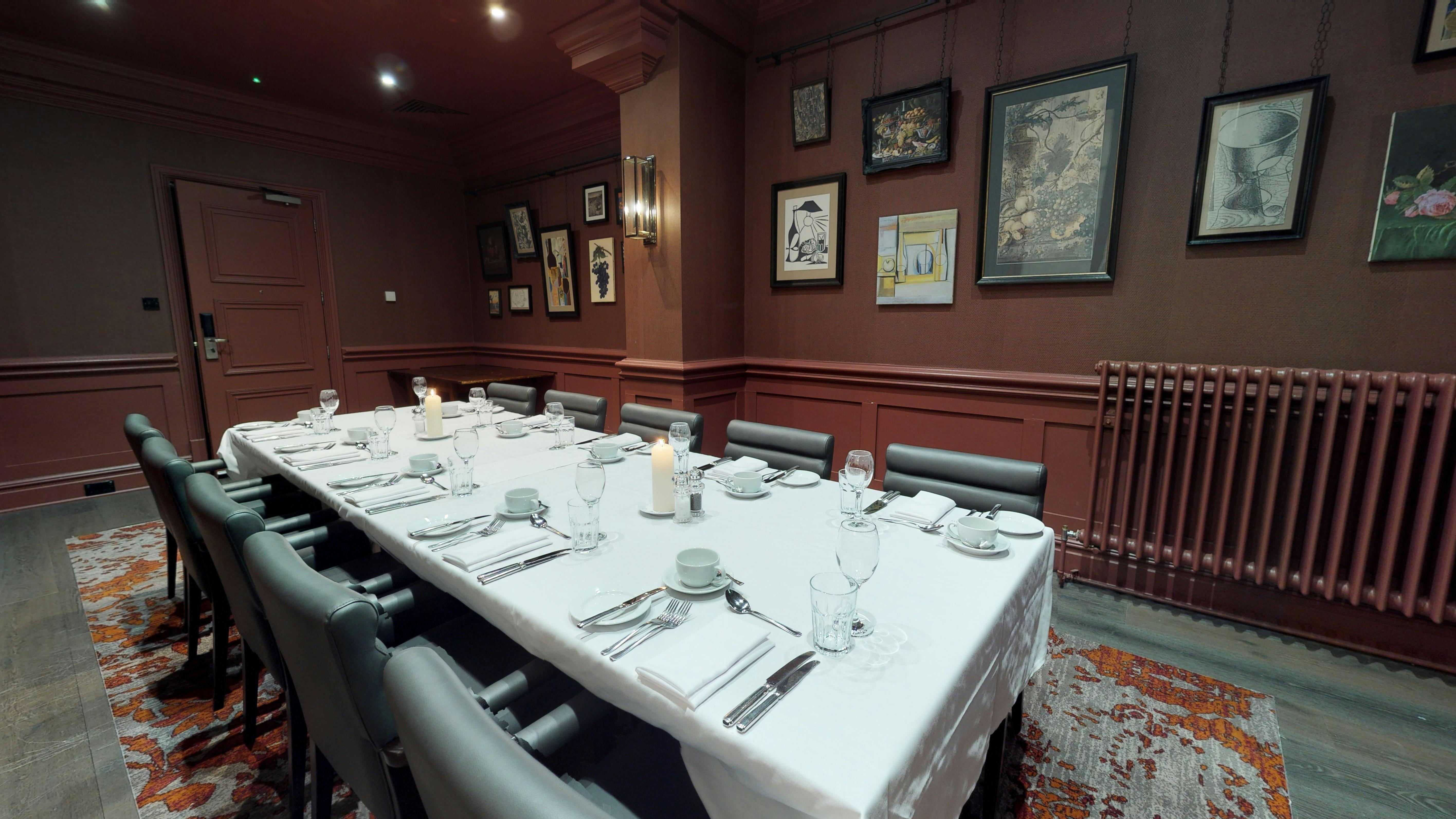 Opus One meeting room at Hotel du Vin, elegant table setup for corporate events.