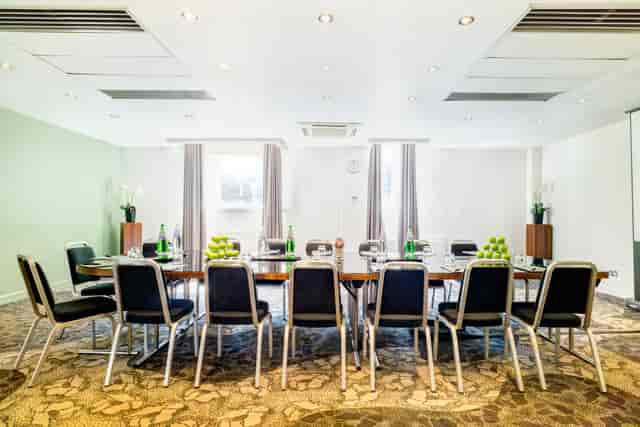 Meeting room at Apex Grassmarket Hotel, set for workshops with natural light and focus.