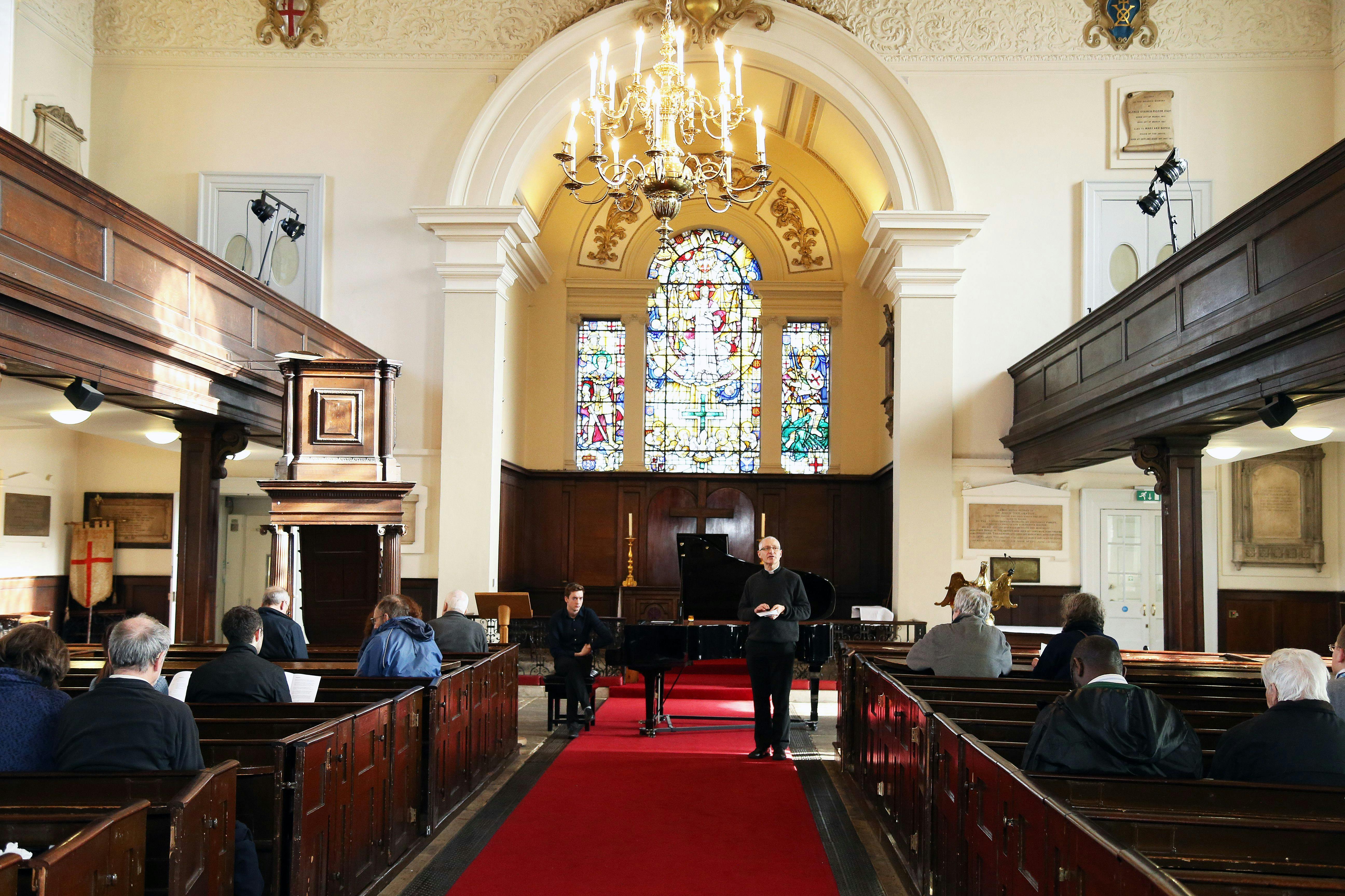 St George the Martyr Church interior with stained glass, ideal for intimate events and concerts.