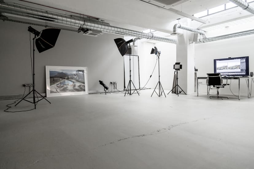 Versatile contemporary event space with professional lighting for workshops and product launches.