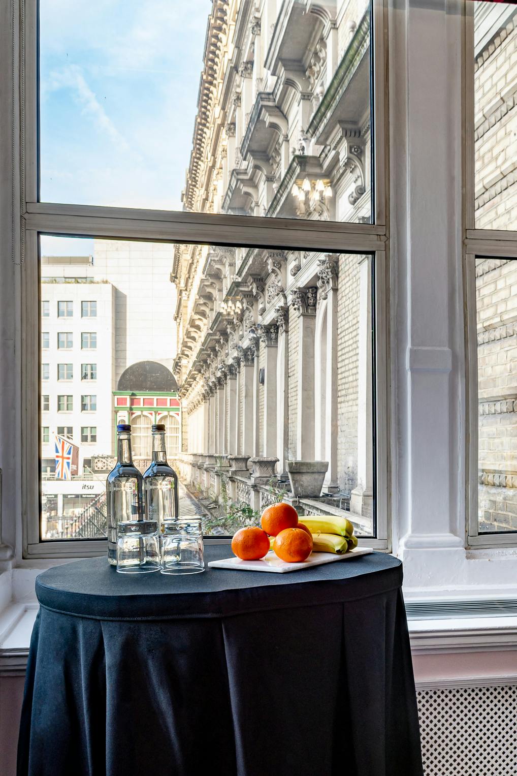 Bright meeting space at Clermont Charing Cross with elegant architecture and refreshments.