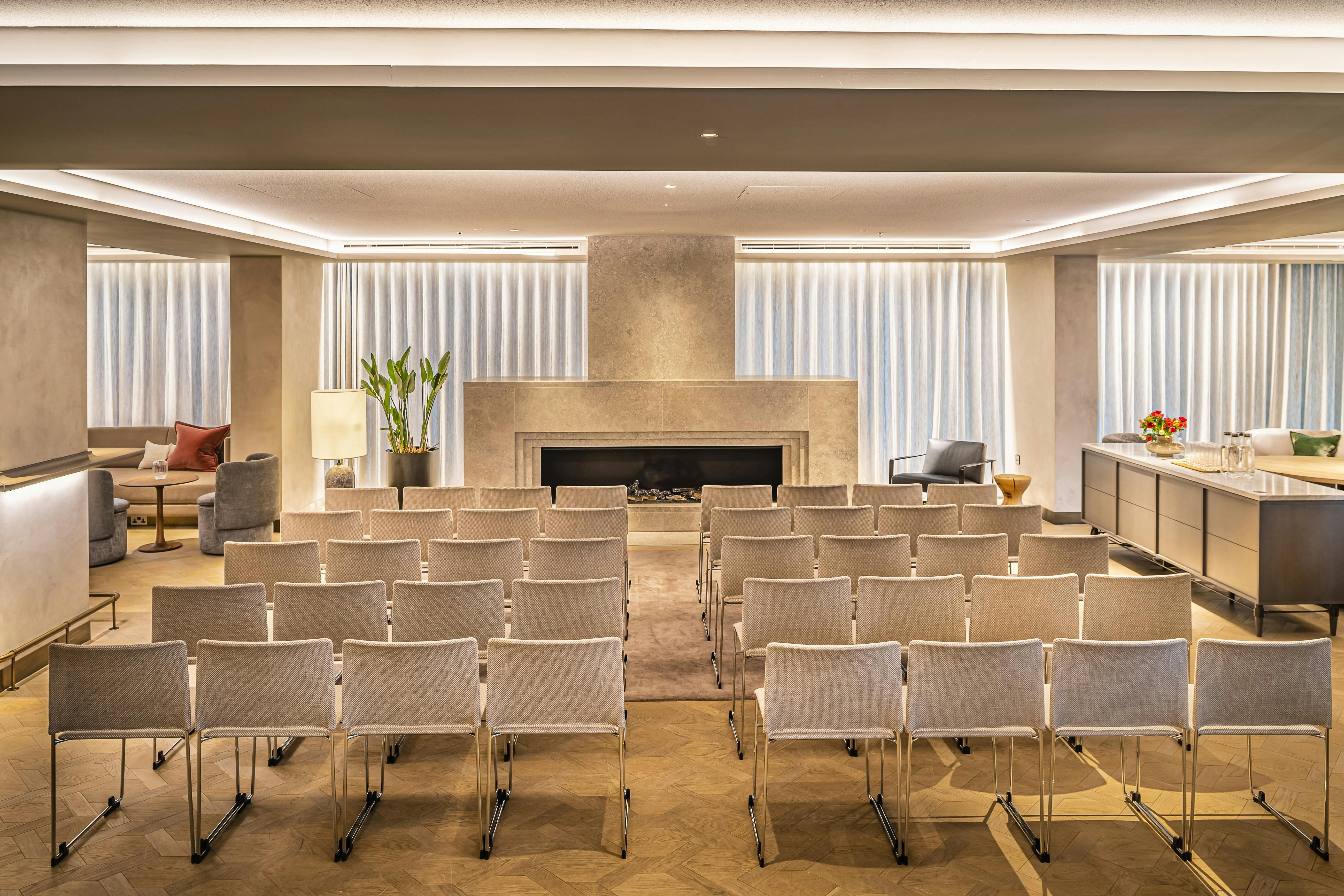 Modern meeting space at The Mezzanine, ideal for presentations and workshops.