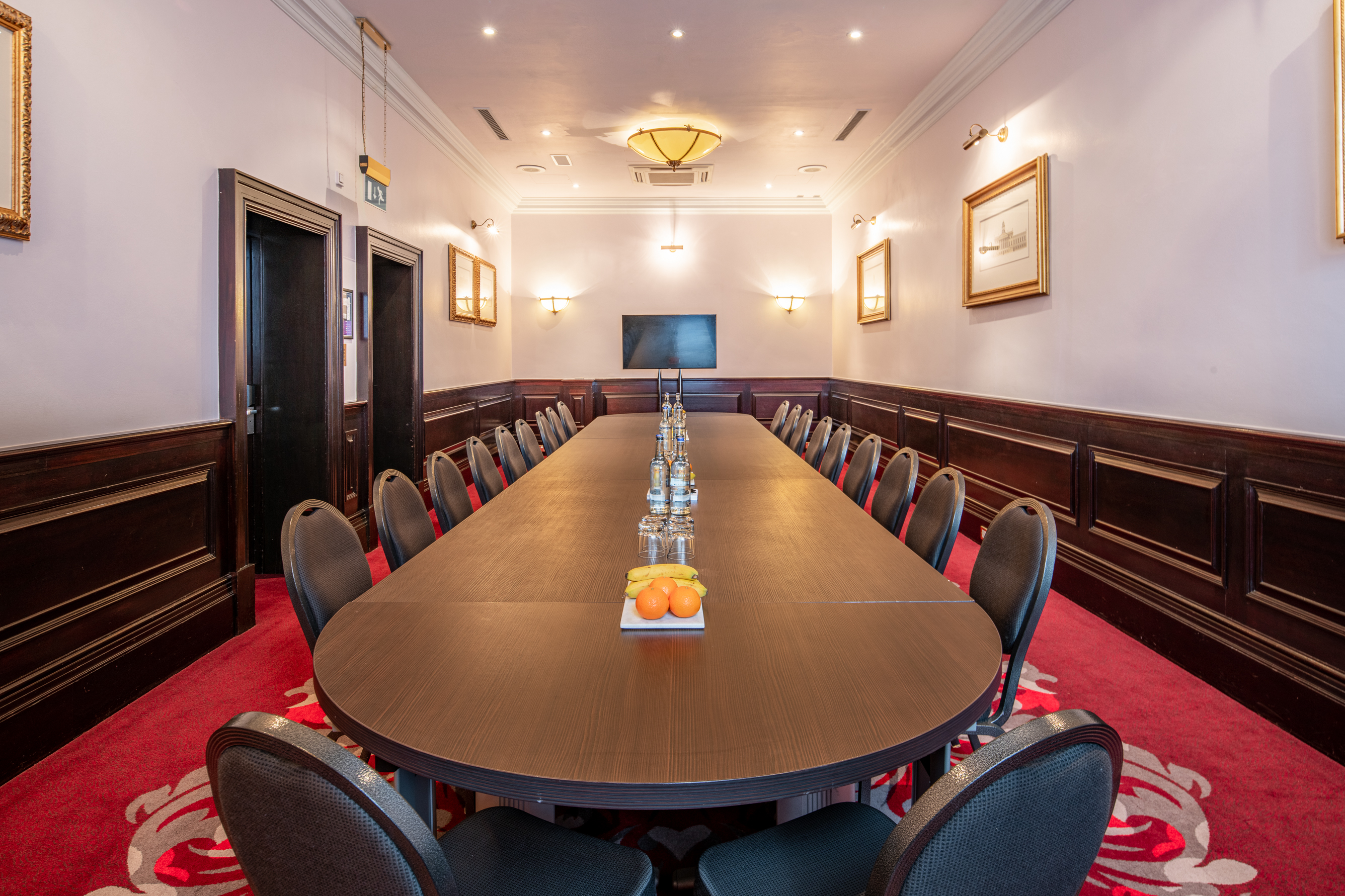 Boardroom at The Clermont Charing Cross, elegant table for corporate meetings and events. - Banner