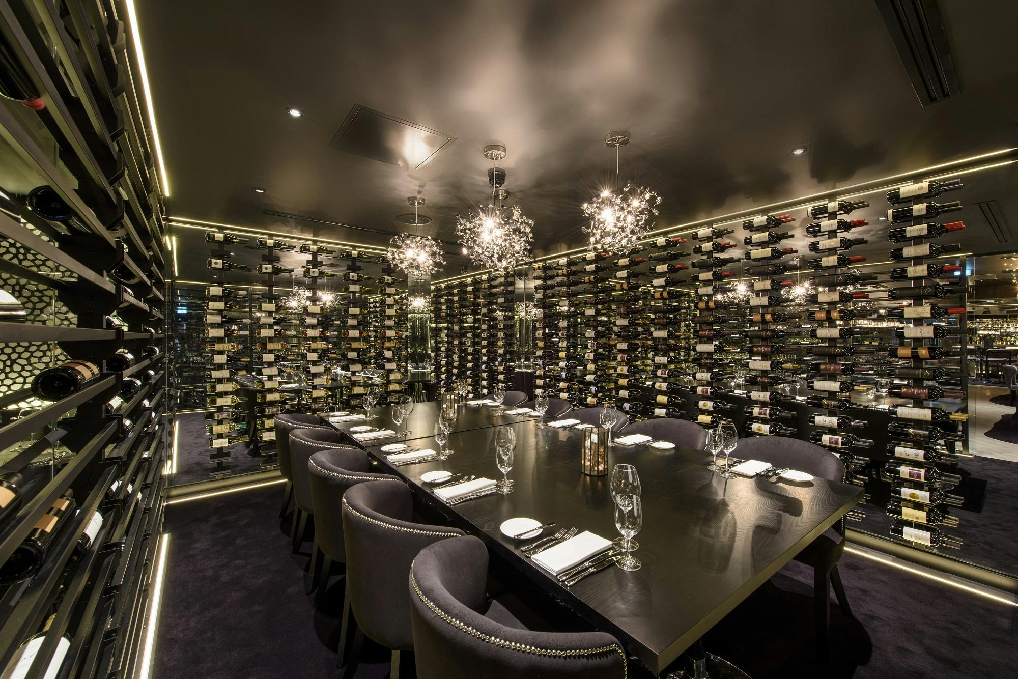 Private dining room in Gaucho Birmingham with wine wall, ideal for corporate events.