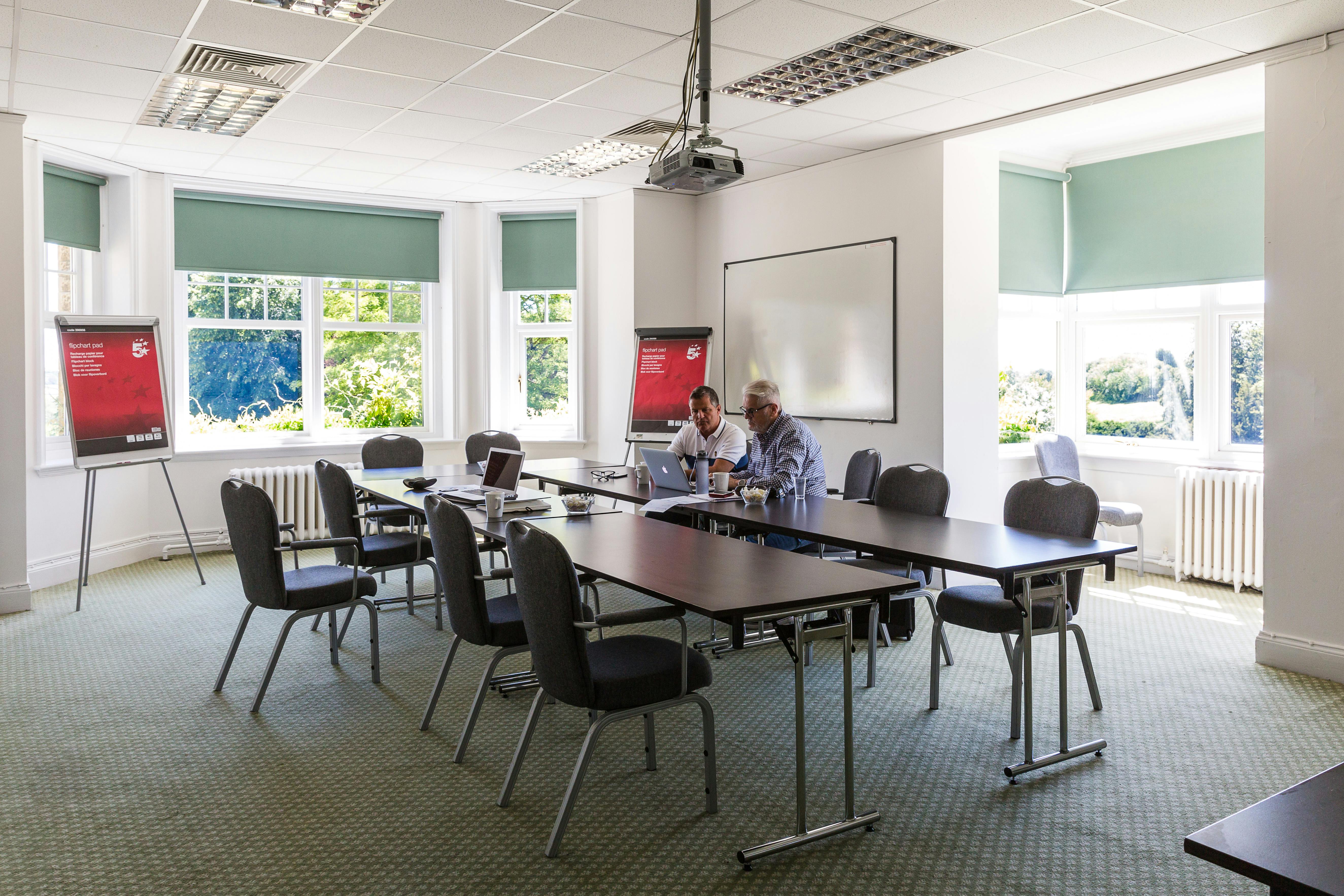 William Stokes in a well-lit meeting room, ideal for workshops and presentations.