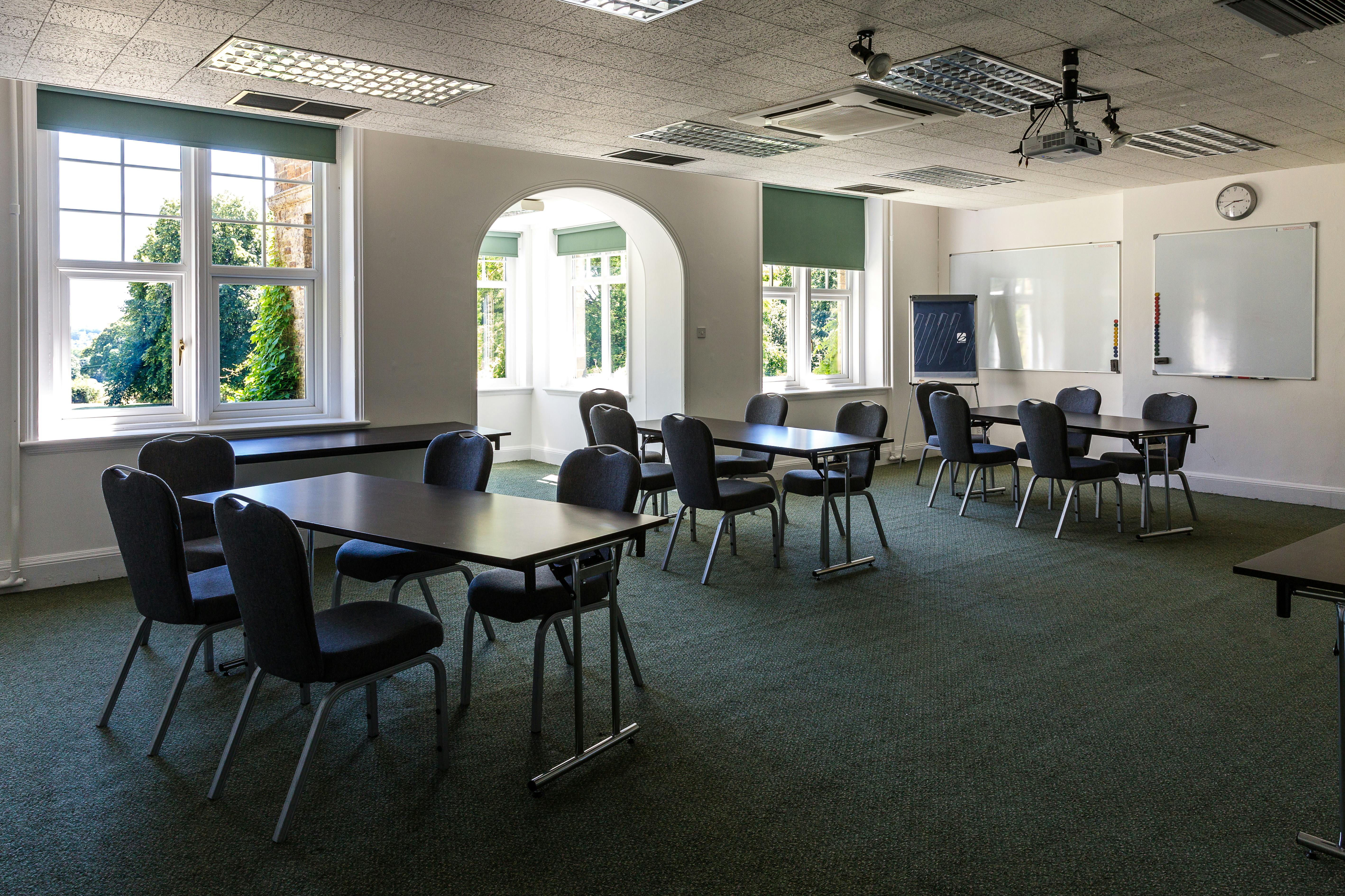 Versatile meeting room at Middle Aston House, ideal for workshops and discussions.