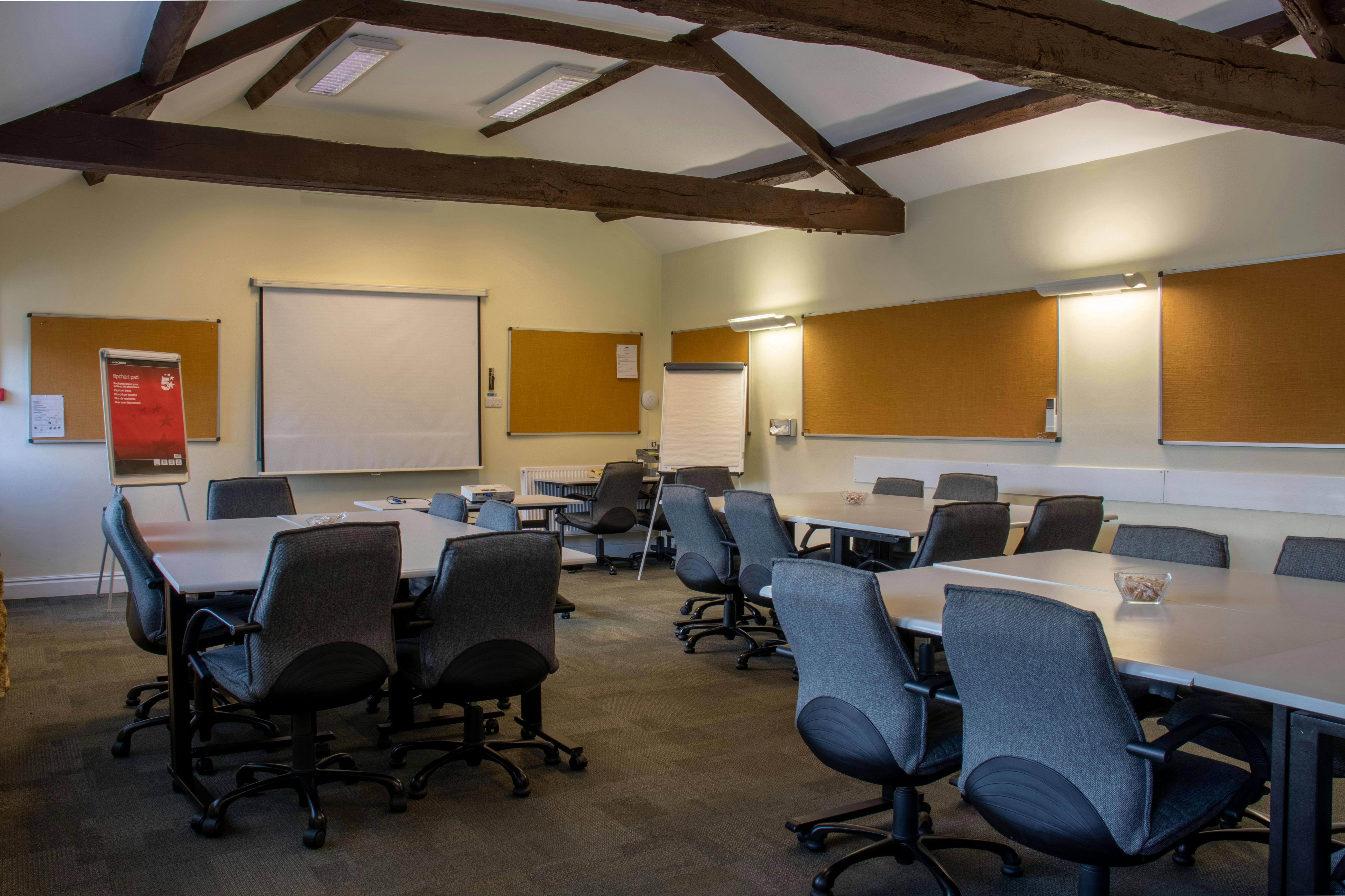 Versatile meeting room at Brympton, ideal for workshops and presentations.