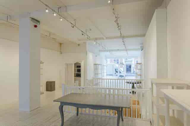 Versatile event space at 725 Fulham Road with natural light, ideal for workshops and gatherings.