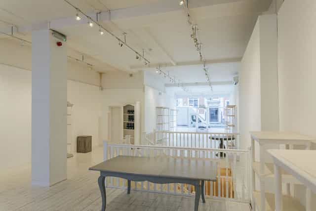 Versatile event space at 725 Fulham Road with natural light, ideal for workshops and gatherings.