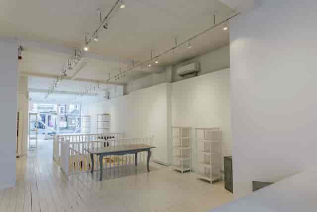 Modern event venue with ample natural light, perfect for workshops and networking.