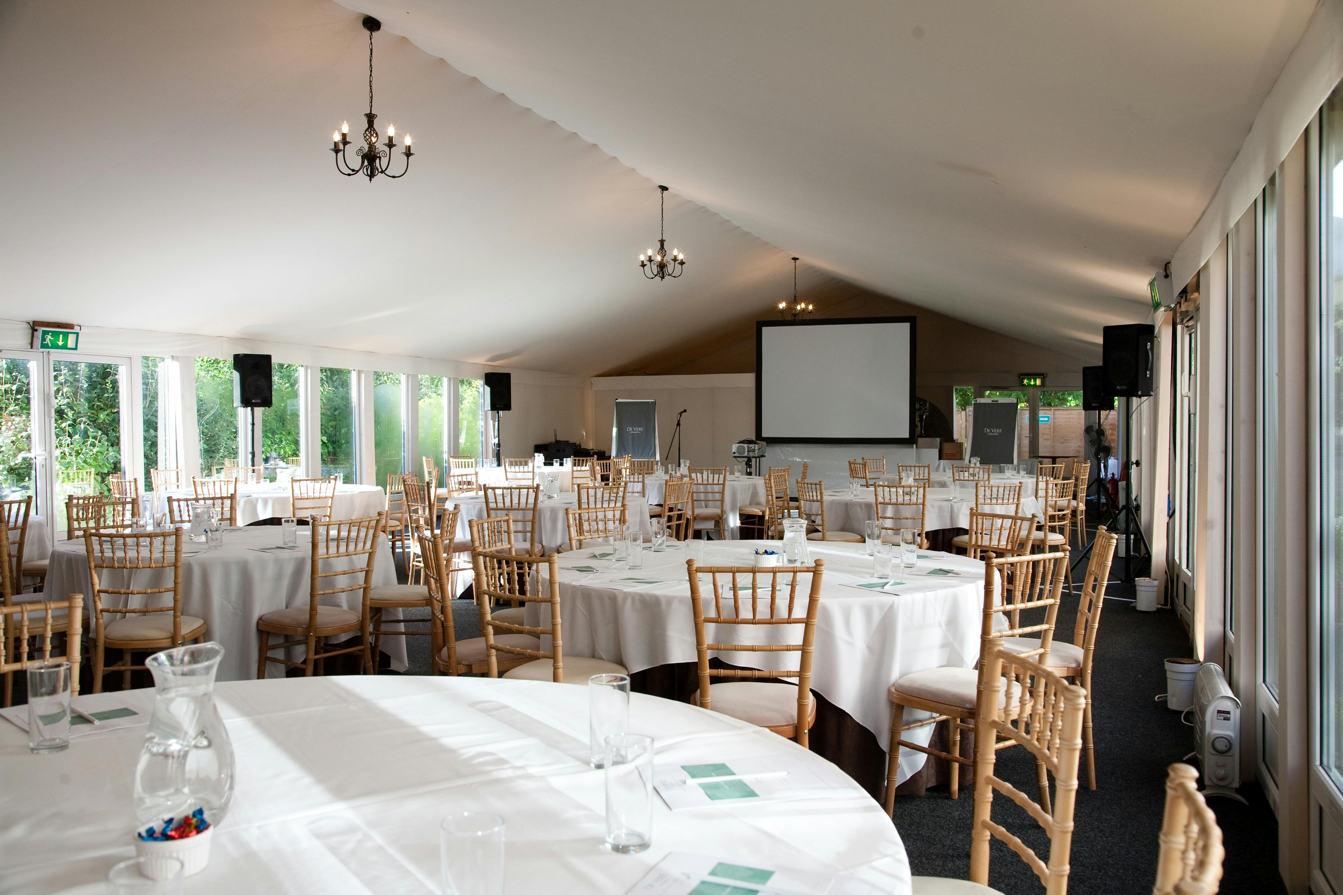 Terrace Marquee at Hunton Park Hotel, elegant dining setup for corporate events and gatherings.