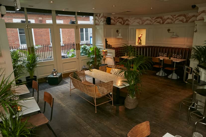Ground Floor Bar and Restaurant event space with natural light, ideal for networking and dinners.